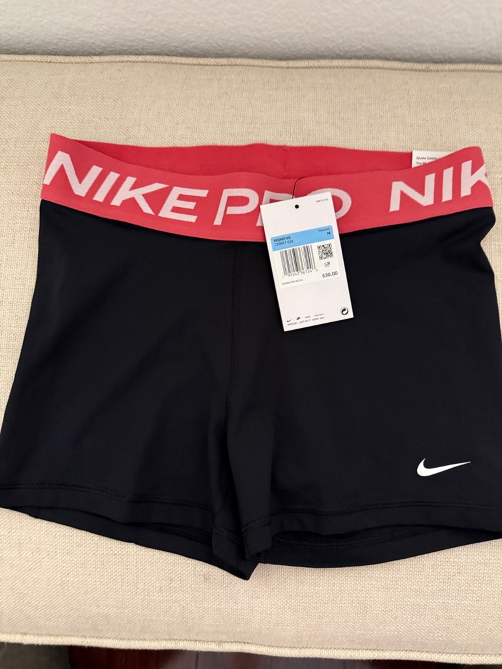 Nike Women's Black Athletic Shorts with Salmon Pink Branded Waistband NWT